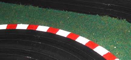 Track Borders Painted to Resemble Striped FISA Curbing